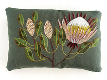 Load image into Gallery viewer, Embroidered floral design on a green pillow with a white background